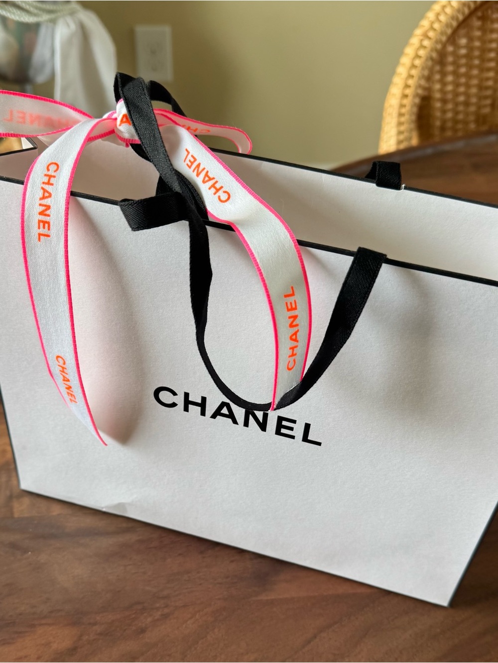 CHANEL White Shopping Tote with Pink-Trim Ribbon and Black Handles